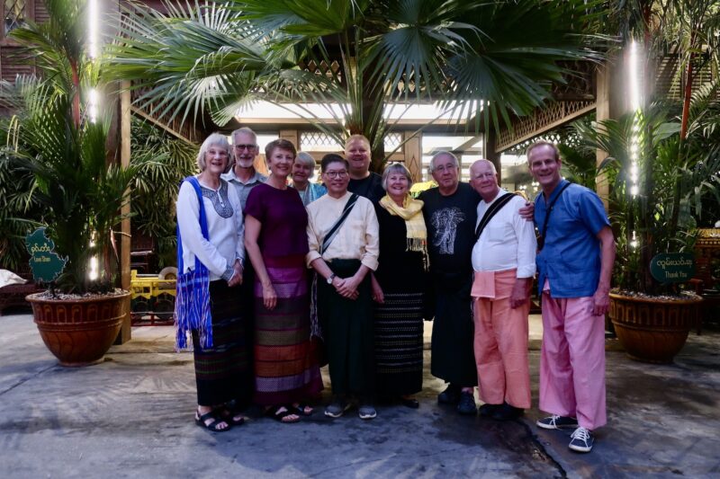 All dressed in traditional costume for a farewell dinner with the staff at Yangon. Image supplied