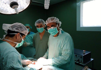 Al Ahli surgical team performing an operation on an injured patient