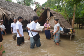 Local villagers receiving emergency relief supplies in Mandalay Diocese. ©CPM 2015