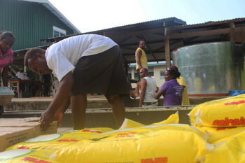 Distribution of relief supplies at the evacuation centre in Honiara.