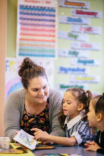 A teacher during morning reading group at Gawura School. © St Andrew’s Cathedral School, used with permission. 