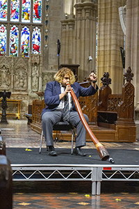 Izak plays the didgeridoo.