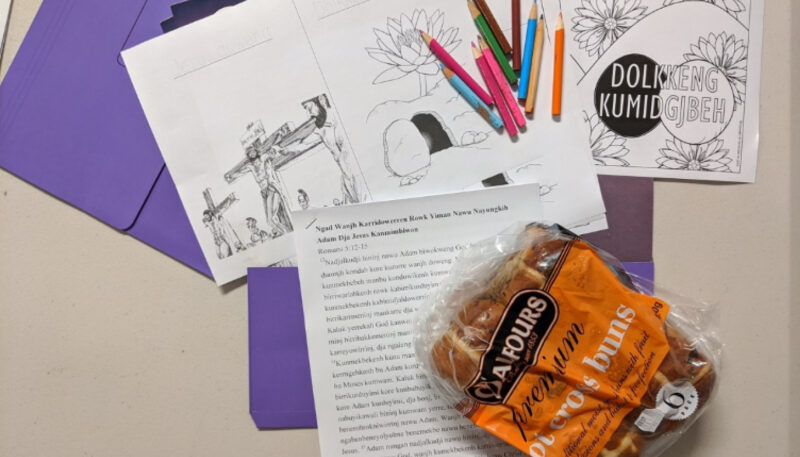 Hot Cross Buns and bible story colouring materials were able to be taken home by parents and grandparents for their children during COVID-19 restrictions