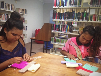 Women crafting some special bears for their children