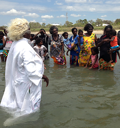 Rev Yulki Nungumajbarr leading baptisms