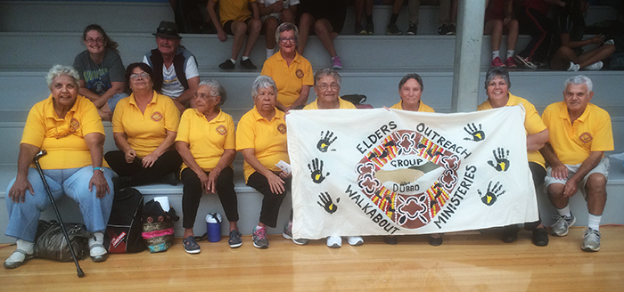 Walkabout team with their banner