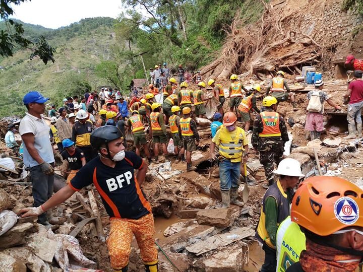 Caption: Rescue workers at the site of a landslide in Benguet Municipality caused by the cylone. © E-CARE