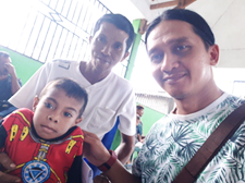 Reihan, his father and a worker from local organisation, YEU (photo courtesy of ACT Alliance) Reihan, his father and a worker from local organisation, YEU. (photo courtesy of ACT Alliance)