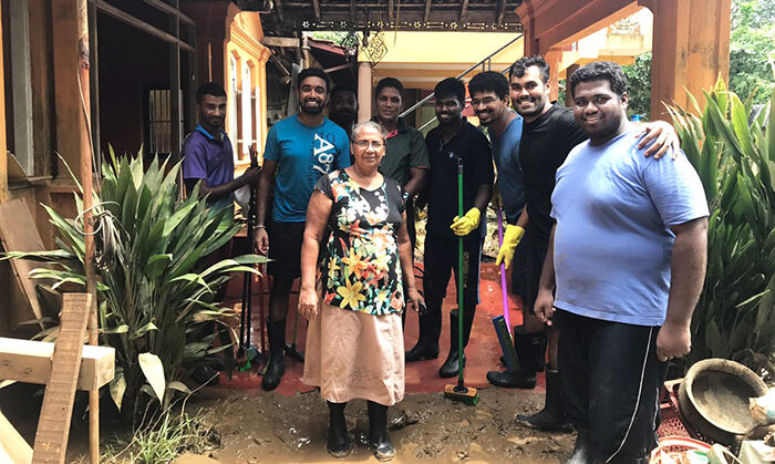 Cleaning up after the floods. © Church of Ceylon, Colombo Diocese.