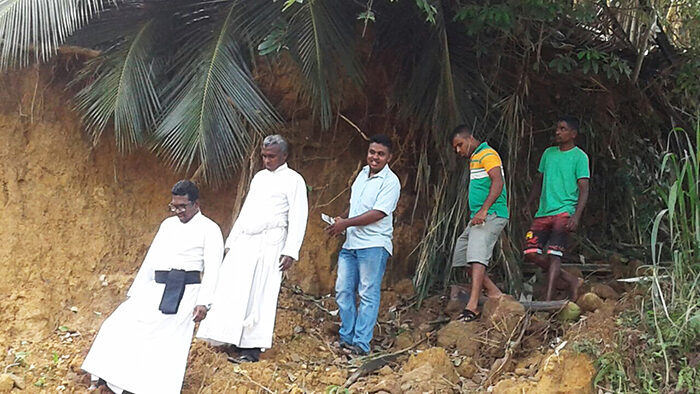Clergy out and about during the floods in Sri Lanka. © Church of Ceylon, Colombo Diocese.