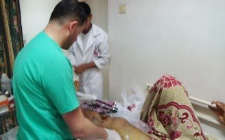 Tending to patients at the Ahli Arab Hospital in Gaza