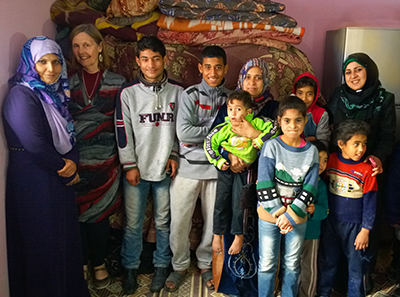 Hyat and her family pose with Dr Julianne Stewart