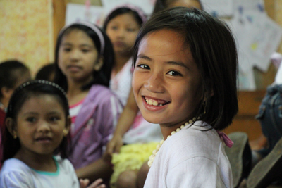 Girl in the Philippines. © ABM/Brad Chapman 2013