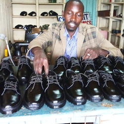 Amos with his thriving business as a shoemaker . © Diocese of Eldoret Community-Based Rehabilitation Centre, 2018, used with permission