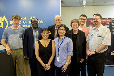 Canon Kistos Khisa, second from left, with Fr John and Kaye Corner (centre back row) and ABM staff