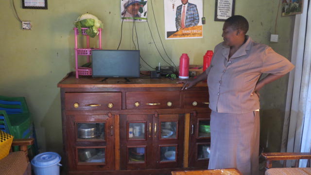 Lena Mueni with her tv