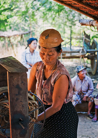 A woman fetches water from a new well in Myi Ni Gone village. © ABM/Ivy Wang 2017.