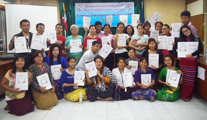 Participants show the new Activity books