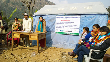 Water Users' Group meeting with ACT monitoring team in Baramchi Village, January 2016 . © Julianne Stewart/ABM.