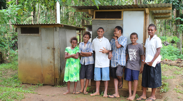 Students with their new VIP toilets at St Barnabas Primary in Vanuatu. © Isabel Robinson/ABM, 2014.