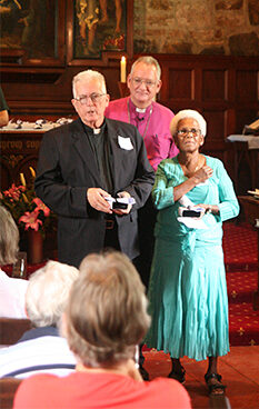 Archbishop Phillip Aspinall and Coaldrake Award recipients The Rev Richard Bowie and Mrs Joyce Bowie.