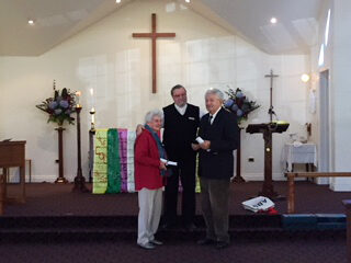 Canon Brian and Margaret Lyons receiving the Coaldrake Award.