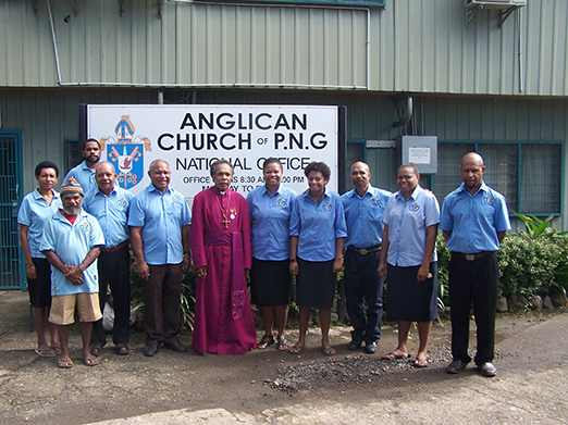 Archbishop Allan Migi with the staff of the Anglican National Office (Lae, PNG) © Anglican Church of Papua New Guinea, 2019