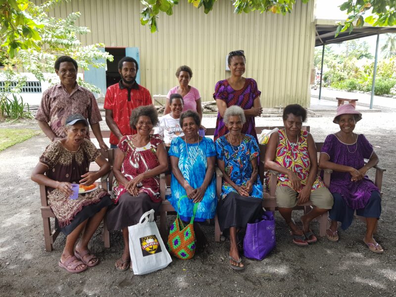 Lae Adult Literacy teachers and students. Back row: Fr Raymond (L) stands next to Joseph. Clara is on the right. In the front row, Julie is on the left, and Sharon is in the middle.