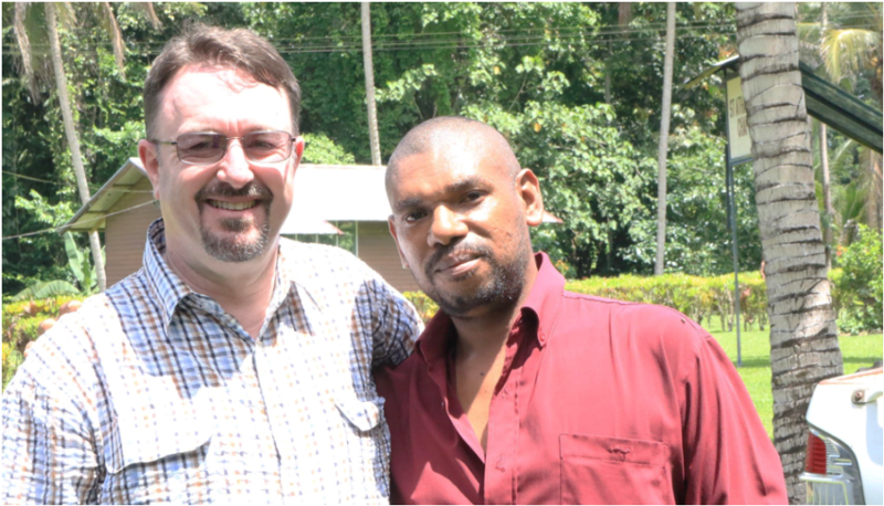 Fr Leki (pictured with ABM’s Partnerships Coordinator, Robert McLean) while studying at Newton Theological College in 2018. © Newton Theological College.