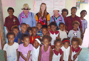 John, Rowena and Felicity with Elementary Prep teachers and students at Christ the King School, Orobada, Port Moresby.