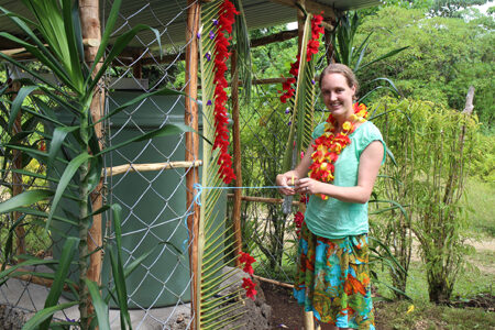 ABM Vanuatu Coordinator Isabel Robinson officially opens the Stonehill water tank in Vanuatu.