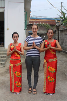 Isabel Robinson with local villagers, Mei and Ying.