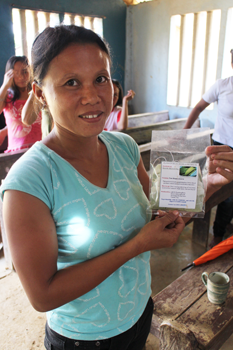 A community member shows off herbal tea produced in Pandong Bato.