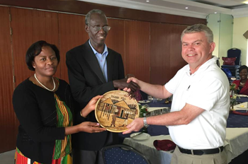 Archbishop Eliud and Mrs Rhoda Wabukala with Rev John Deane at an Anglican Alliance meeting in 2015. Used with permission.