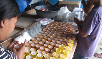 Candle making in Talisay City, Cebu. © Lina Magallanes/ABM, 2015.