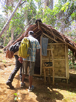 Inspecting a VIP toilet on Gaua Island.