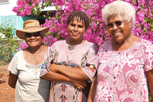 Lincoln (centre), a young local in Bamaga, North Queensland engaging with elders Monica and Maria. © Michael Begaud/ABM, 2014.