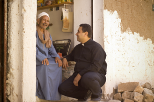 A priest in Alexandria, Egypt, visits a member of the community. (Image: ABM/Don Brice 2005)