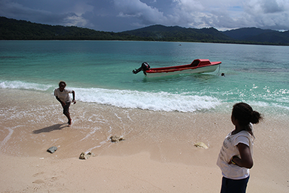 Boat off the coast of Pamua Island, San Cristobel