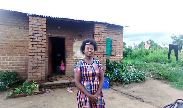 Diana has had electricity connected to her home since joining the Chiyambi Savings with Education Group two years ago.