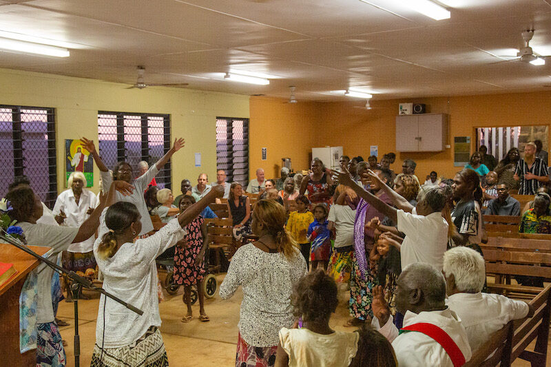 Mildred Mamarika (in red) with Edna Barra and Colleen Mamarika from Umbakumba community sharing about St Mary’s Umbakumba with other Aboriginal leaders at the Pre-Synod Gathering. © TK Beer, Diocese of Northern Territory, 2019.