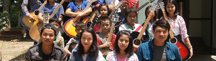 Students with their instruments during a music lesson. © St Peter’s Bible School, 2018.